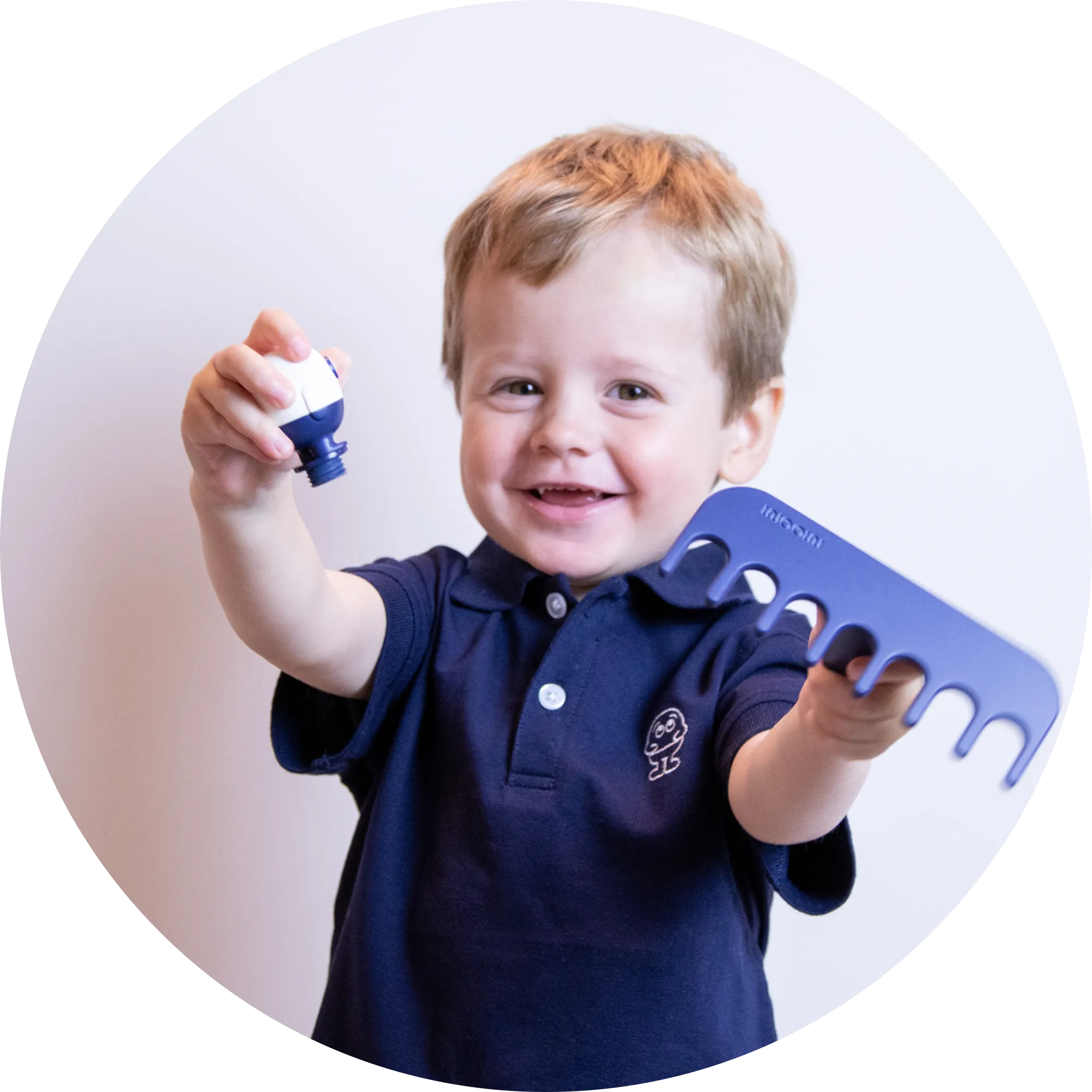 Child wearing a navy blue shirt with a logo, holding a blue and white golf add on.